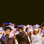 The photo is of a graduation. There's no graduation without financial aid.