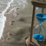 The the picture shows an hourglass representing counting down to retire.