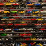 To represent diversification as an investment strategy, the picture shows many toy cars of different types and colors.