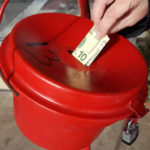 The picture shows a pot for charitable giving.
