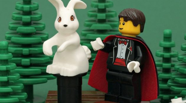 The picture is of a Lego magician and rabbit to represent financial tips and tricks.