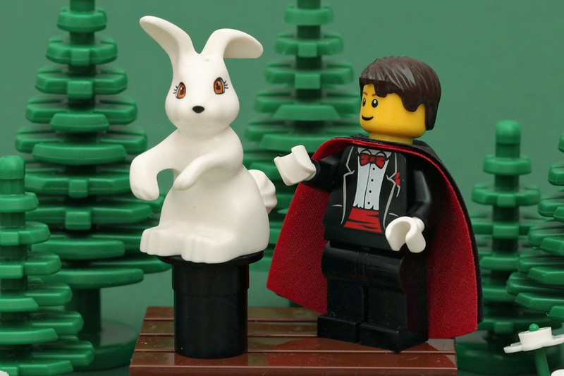 The picture is of a Lego magician and rabbit to represent financial tips and tricks.