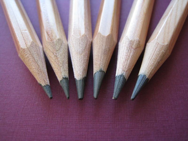 The picture shows the tips of pencils to represent financial tips.
