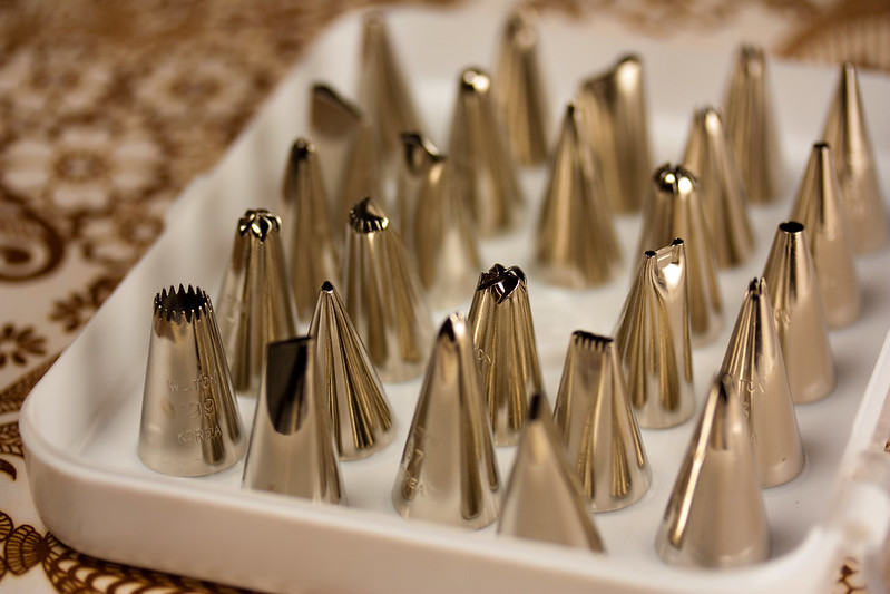 The picture is of pastry decorating tips. They represent financial tips, loosely.
