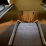 This is a picture of a down escalator to represent stocks and bonds declining.