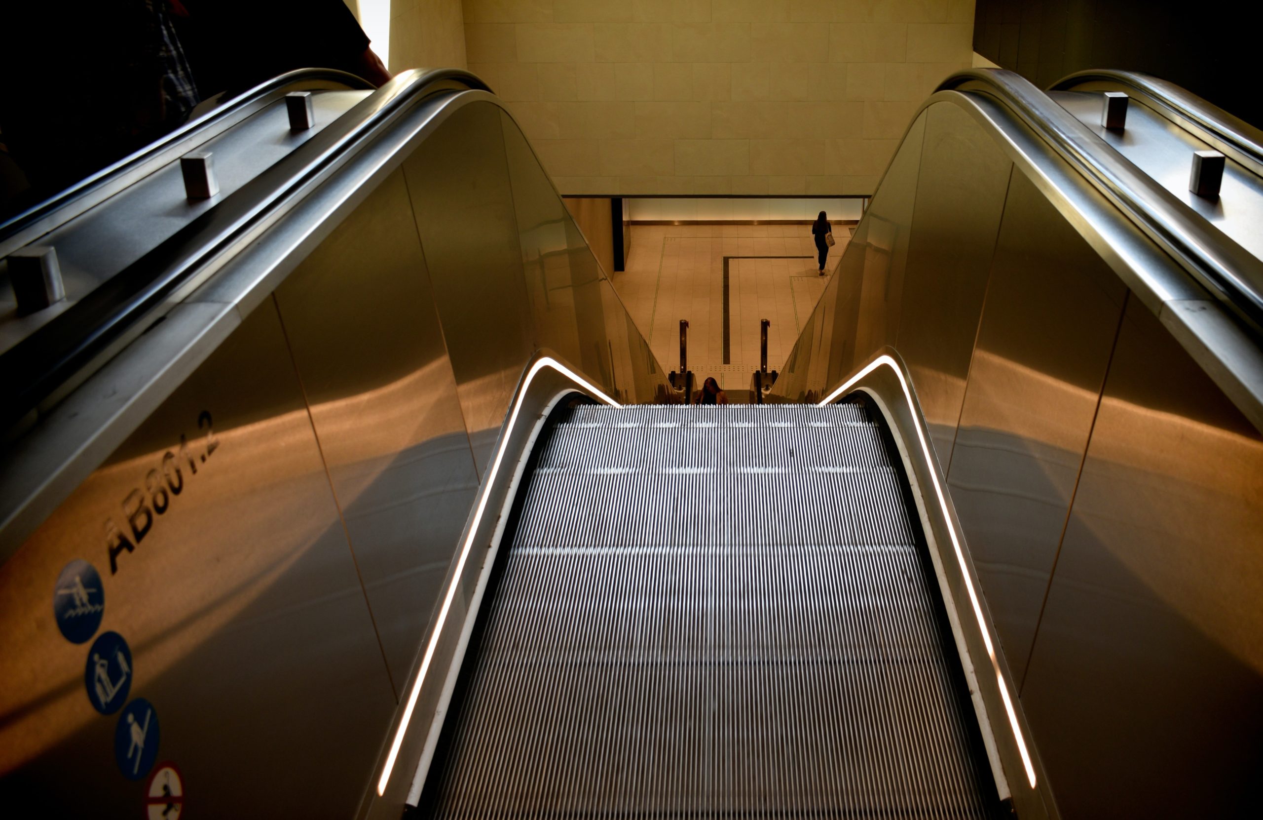 This is a picture of a down escalator to represent stocks and bonds declining.