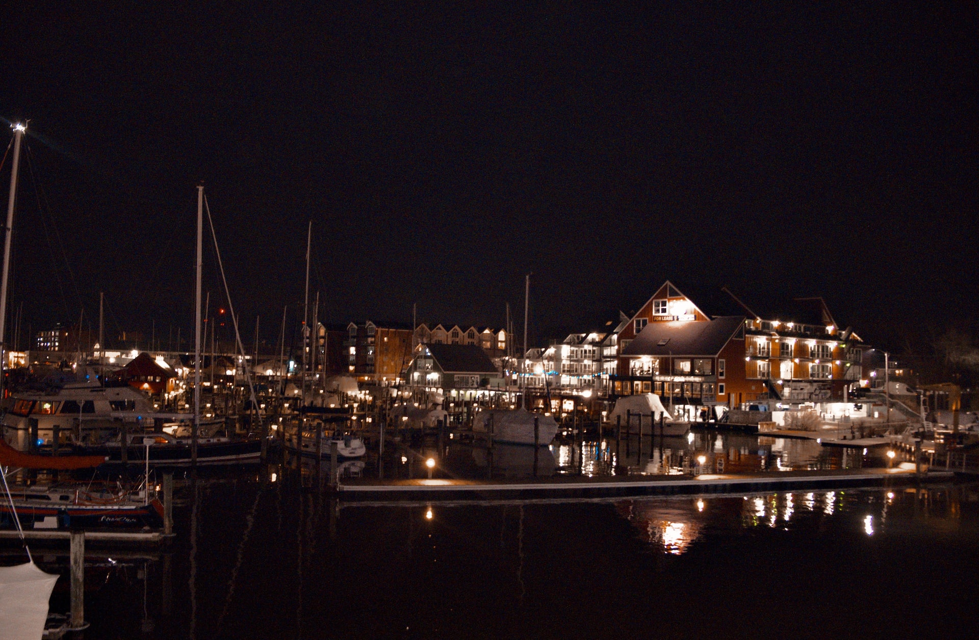 The picture shows Annapolis harbor at night because the person profiled in the article retired to Annapolis. trust