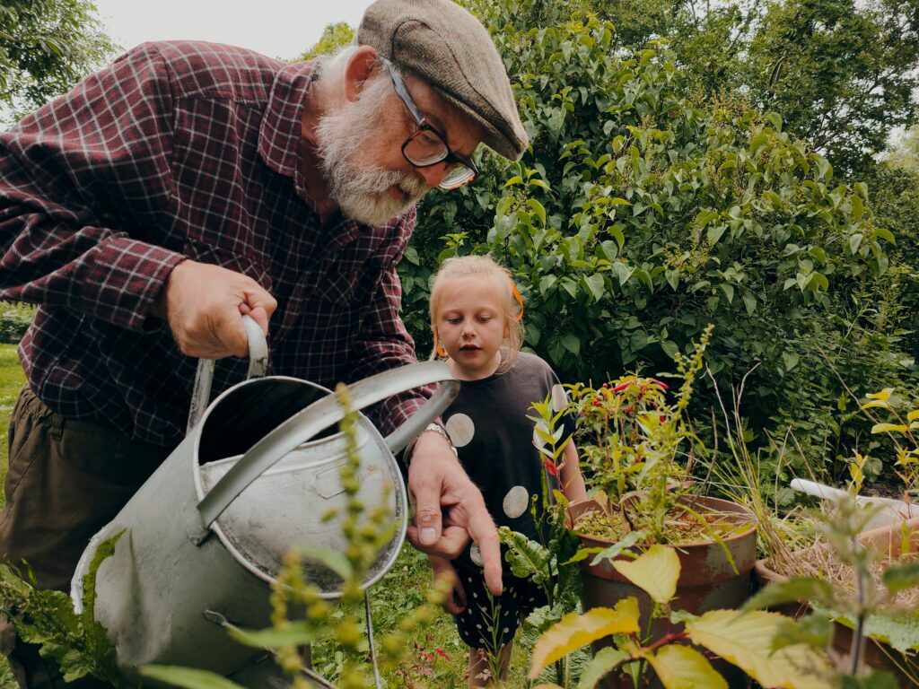 The picture is of a grandfather teaching his granddaughter. This represents his helping her by using trusts to avoid estate taxes.