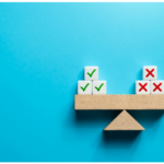 The picture shows scales to represent the pros and cons of QCDs.