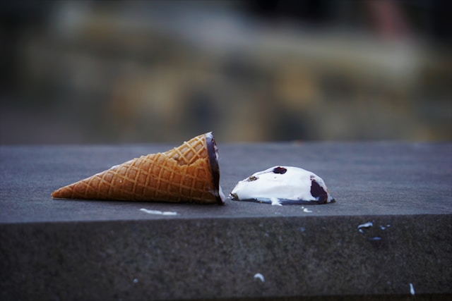 The photo is of a dropped ice cream cone to represent the five biggest Medicare mistakes.