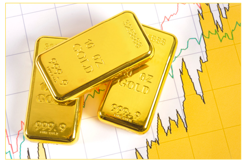 The picture shows gold bars on a chart to represent using gold as an inflation hedge.