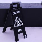 The picture shows a caution sign to represent the question in the title about financial intermediaries.